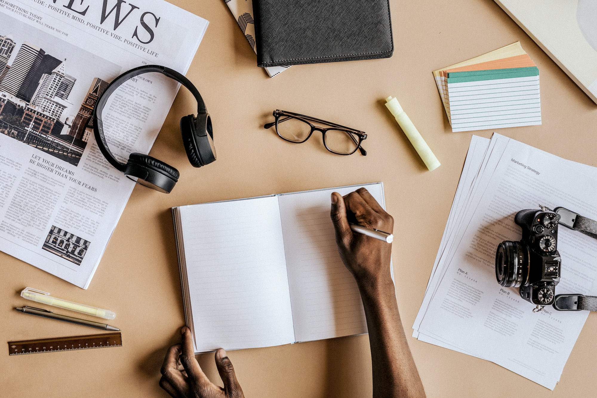 Man writing in a notebook